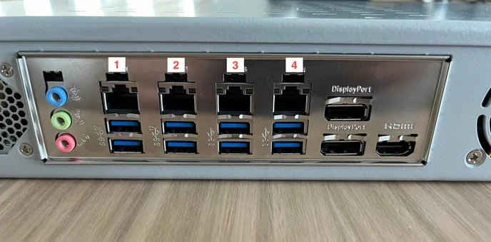 The numbered Ethernet ports at the back of the robot