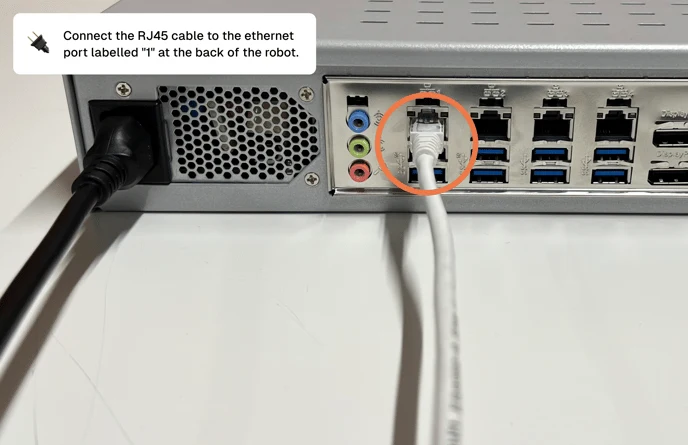 The numbered Ethernet ports at the back of the robot