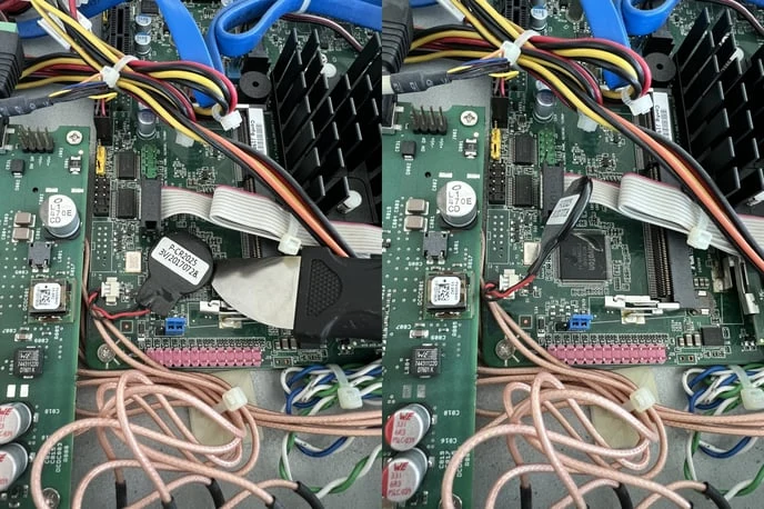 A thin tool slid under the battery to free it from its glue